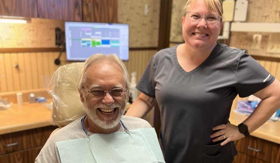 patient smiling after his dental checkup at Georgia Dental Studio
