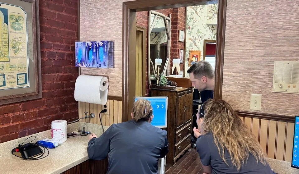 the Georgia Dental Studio team reviewing a patient's x-rays