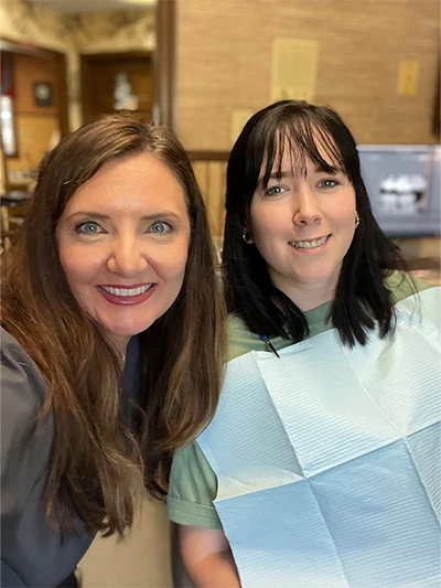 patient smiling with hygienist at Georgia Dental Studio