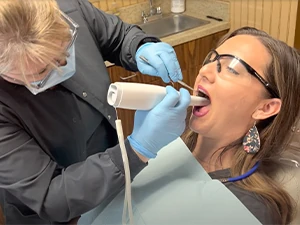 patient receiving a laser dentistry procedure at Georgia Dental Studio