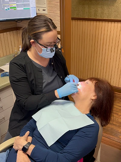 patient getting her teeth cleaned at Georgia Dental Studio in Jersey, GA