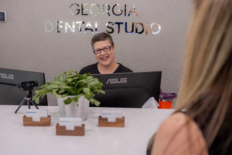 A patient checking in for an oral surgery procedure at Georgia Dental Studio in Jersey GA.