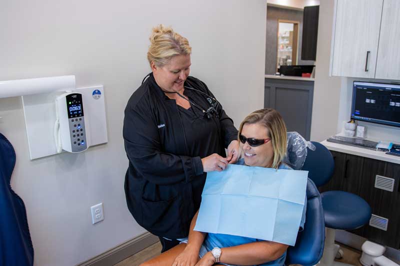 Patient being seated who was scheduled for a dental emergency at Georgia Dental Studio. 