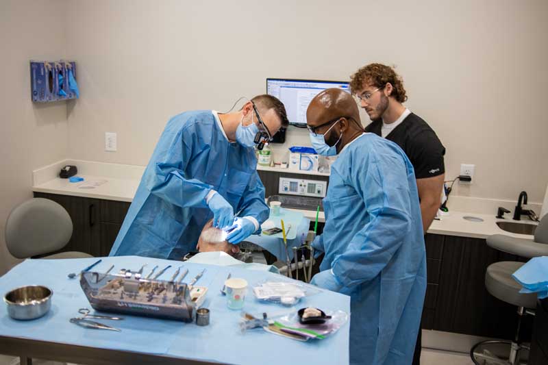 Dr Till working with a patient at Jersey GA, Georgia Dental Studio.